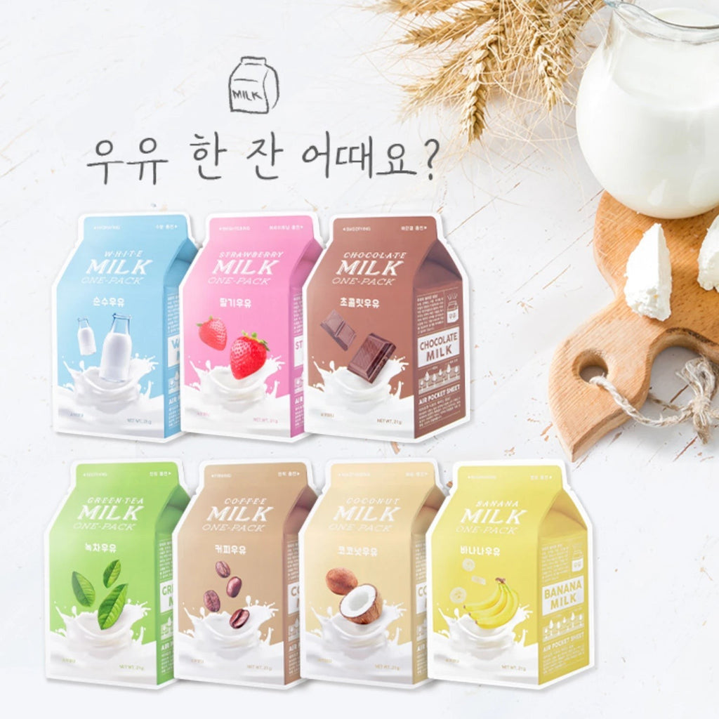 Skin TOGO A'pieu Milk One Pack sheet mask collection featuring various fruit and milk flavors in carton packaging.
