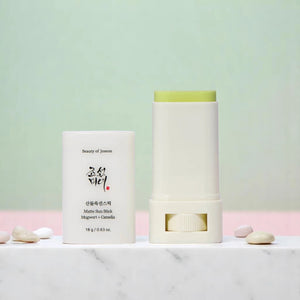 Skin TOGO Beauty of Joseon Matte Sun Stick with mugwort and camelia, SPF50+ PA++++, on a marble surface.