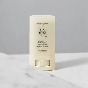 Skin TOGO Beauty of Joseon Matte Sun Stick with mugwort and camelia in a beige twist-up tube for SPF 50+ protection.