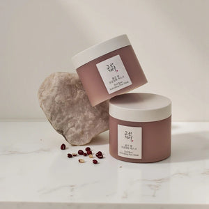 Skin TOGO Beauty of Joseon Red Bean Refreshing Pore Mask jars with red beans and a decorative stone on a marble surface