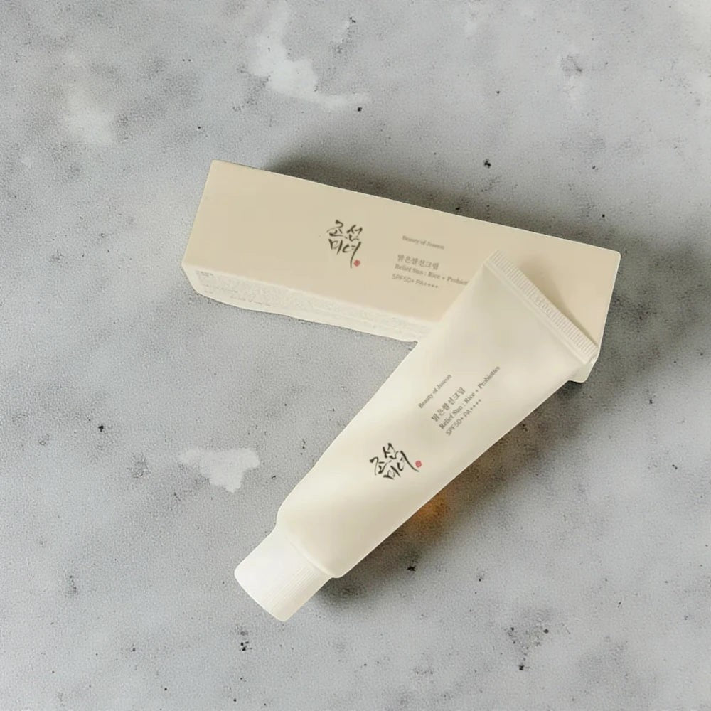 Skin TOGO Beauty of Joseon Relief Sun Rice and Probiotics SPF50+ sunscreen tube and its beige cardboard packaging.