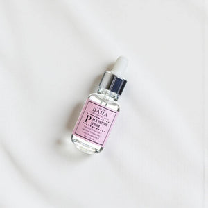 Skin TOGO Cos De BAHA P.M.A Peptide Serum in a 30ml glass dropper bottle with a pink label on a white background.