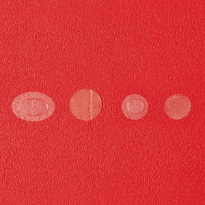Skin TOGO Cosrx AC Collection hydrocolloid acne patches in various sizes displayed on a vibrant red textured background.