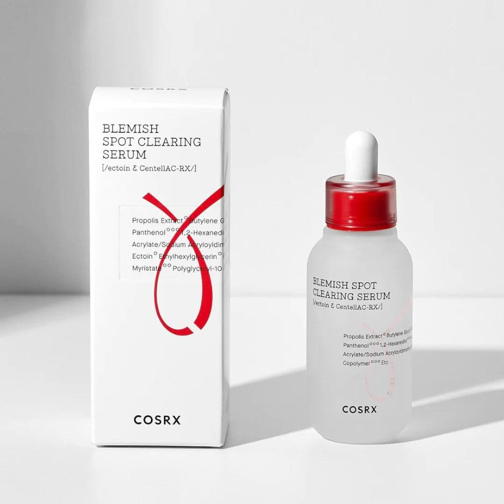 Skin TOGO COSRX Blemish Spot Clearing Serum bottle and white box with red logo, featuring Centella and Niacinamide.