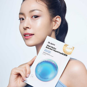 Skin TOGO model holding a Dr.Jart Vital Hydra Solution sheet mask for deep hydration and skin repair.