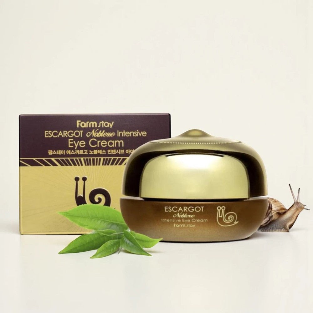 Skin TOGO Farmstay Escargot Noblesse Intensive Eye Cream jar and box with green leaves and a snail on a white background