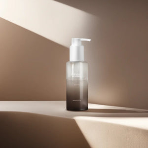 Skin TOGO Haruharu WONDER Black Rice Deep Cleansing Oil in a 150ml pump bottle on a minimalist beige surface.