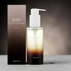 Skin TOGO Haruharu WONDER Black Rice Deep Cleansing Oil bottle and box with a gradient brown and clear design.