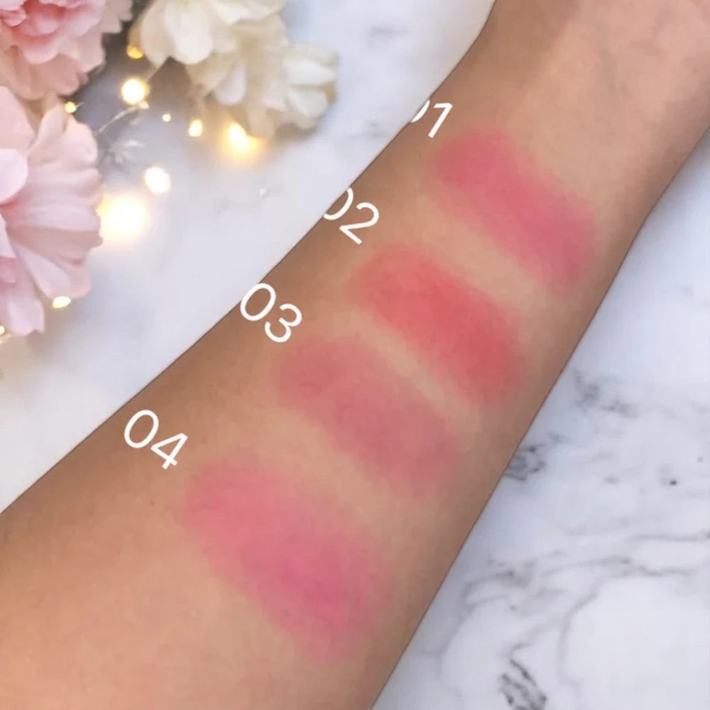 Skin TOGO Luxelux Jelly Tint Stick swatches on arm showing four shades of light pink and rose tints