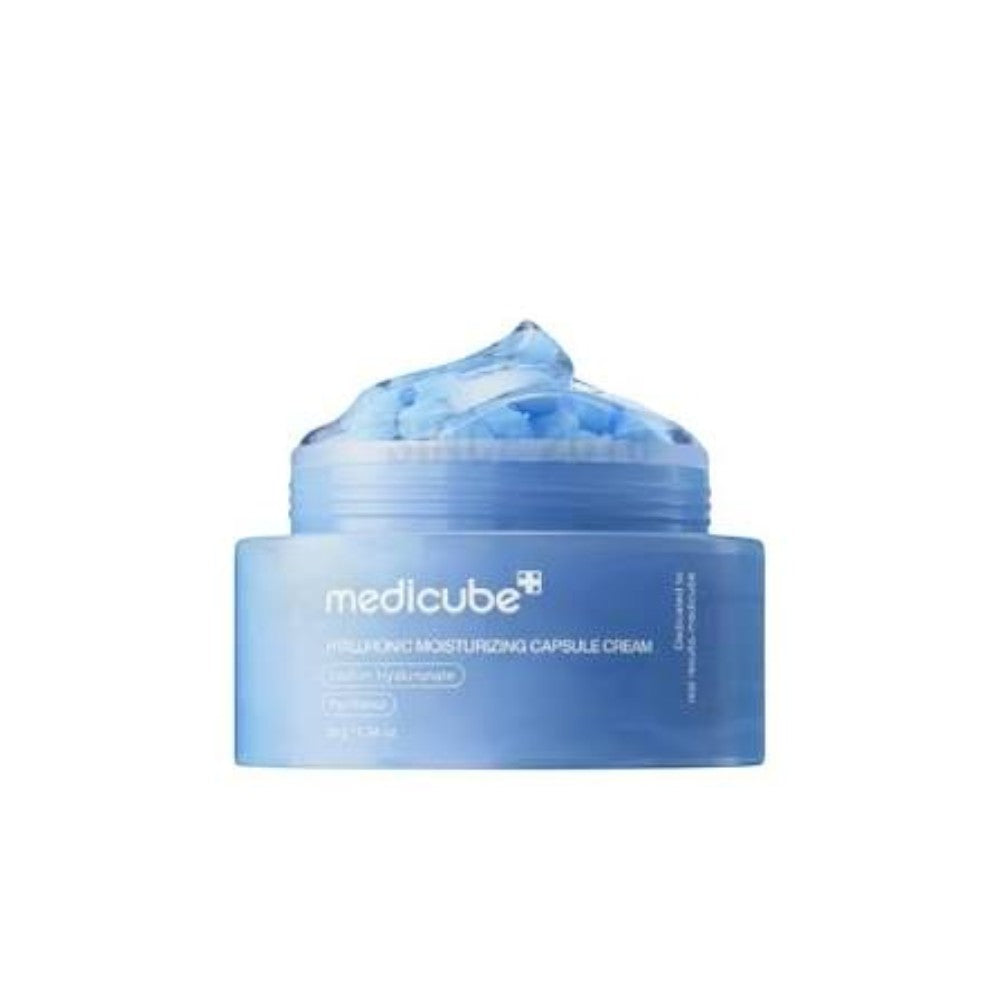 Skin TOGO Medicube Hyaluronic Moisturizing Capsule Cream in a blue jar with visible hydrating gel capsules