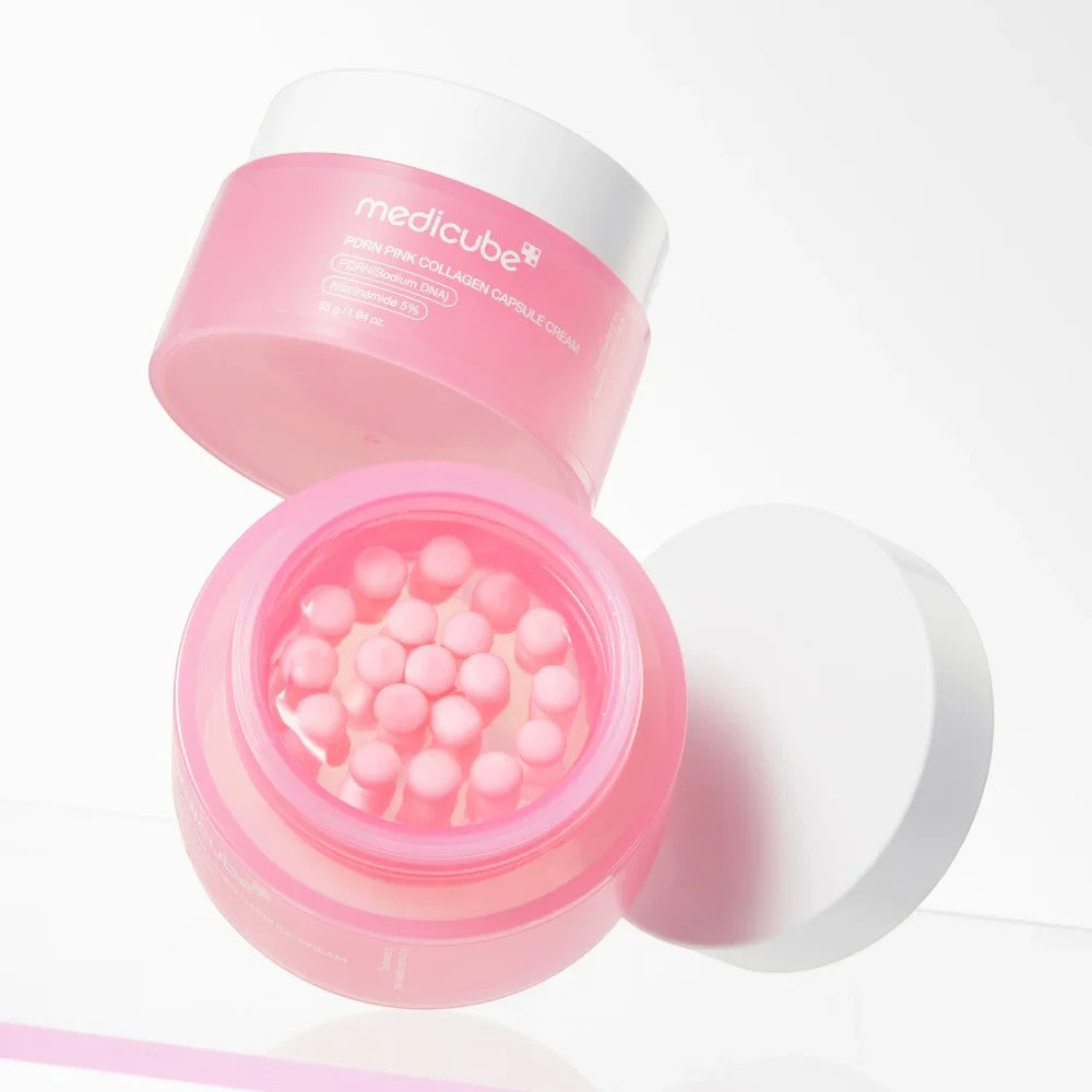Skin TOGO Medicube PDRN Pink Collagen Capsule Cream in a pink jar with visible collagen capsules inside.