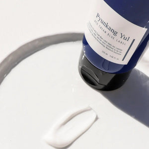 Skin TOGO Pyunkang Yul ATO Cream Blue Label 120ml with a rich white moisturizing cream texture on a white surface.