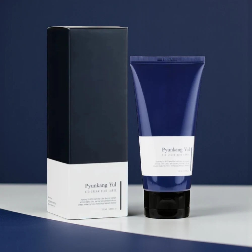 Skin TOGO Pyunkang Yul ATO Cream Blue Label 120ml tube and box for sensitive and atopic skin on a blue background
