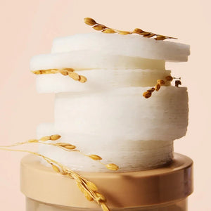 Skin TOGO SKINFOOD Rice Brightening Pads stacked with natural rice stalks for gentle exfoliation and skin hydration.