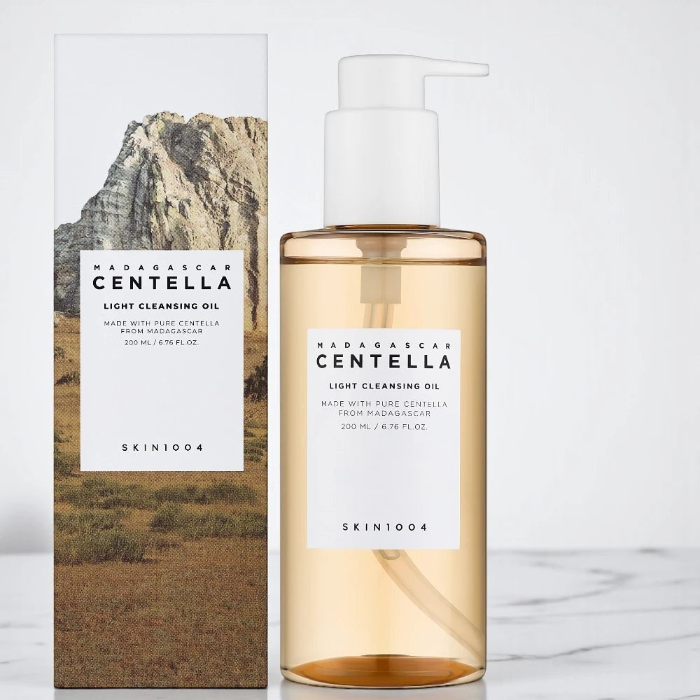 Skin TOGO SKIN1004 Madagascar Centella Light Cleansing Oil bottle and box with mountain landscape design