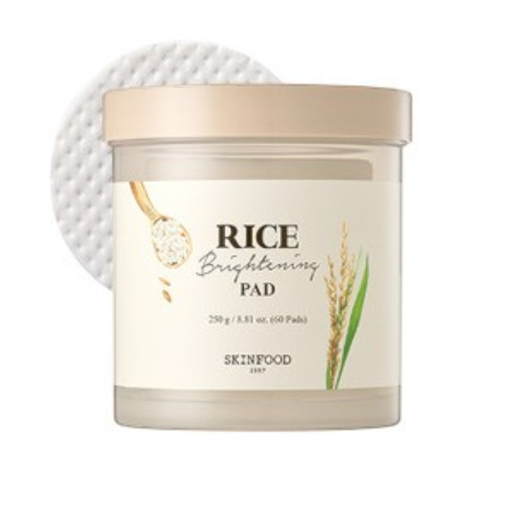 Skin TOGO SKINFOOD Rice Brightening Pad jar with a single textured cotton pad behind it for gentle exfoliation.