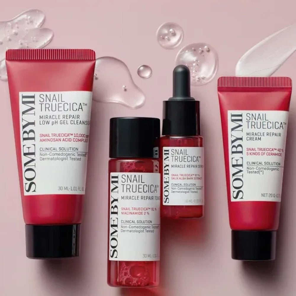Skin TOGO Some By Mi Snail Truecica Miracle Repair starter kit with cleanser, toner, serum, and cream on pink background