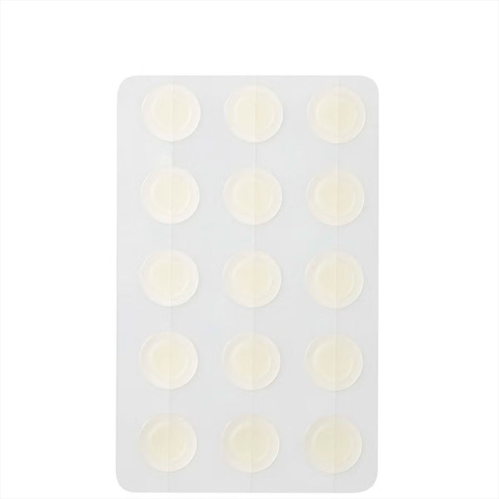 Skin TOGO VT Cosmetics Cica Reti-A hydrocolloid acne patches on a clear plastic sheet for targeted spot treatment.