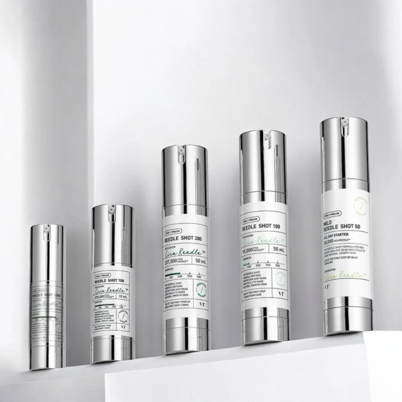 Skin TOGO collection of VT Cosmetics Reedle Shot serum bottles in varying concentrations on a white shelf.