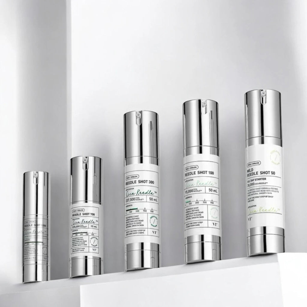 Skin TOGO collection of VT Cosmetics Reedle Shot serum bottles in various concentrations on a white shelf.