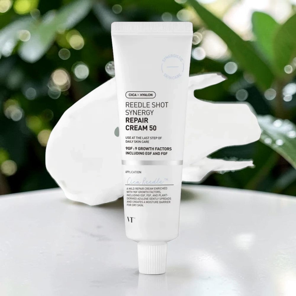 Skin TOGO VT Cosmetics Reedle Shot Synergy Repair Cream in a white tube with a creamy texture swatch behind it.